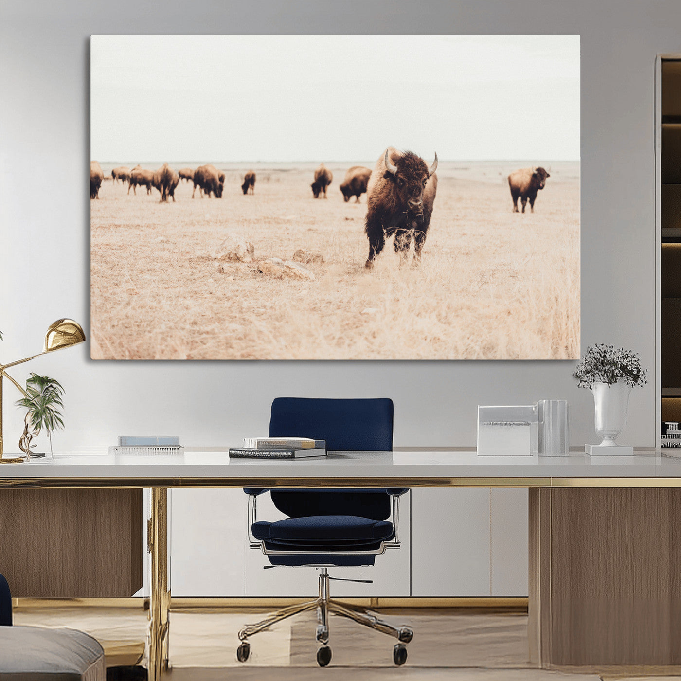 Herd of bison roaming a vast prairie with golden grass under a soft sky, creating a rustic and Western landscape, ideal for wall art.