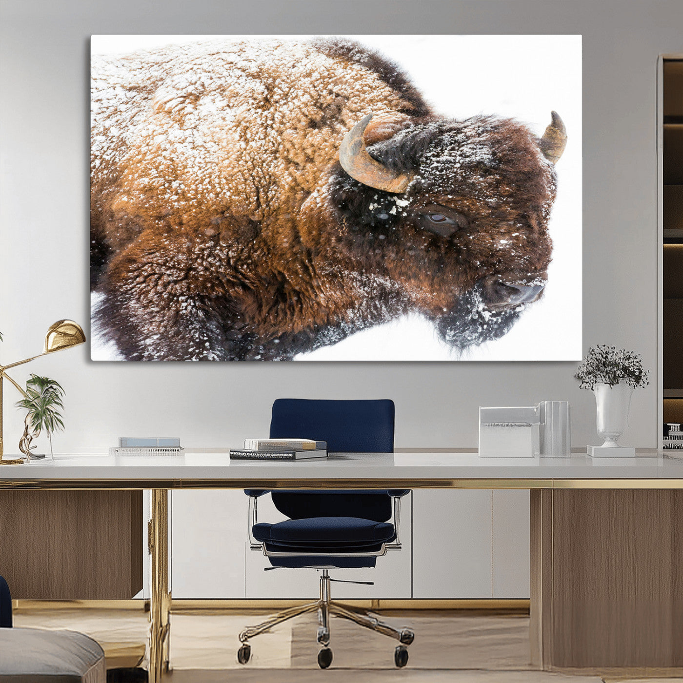 Close-up photograph of a bison covered in snow, highlighting its thick fur and powerful presence, set against a white winter backdrop, ideal for rustic decor.