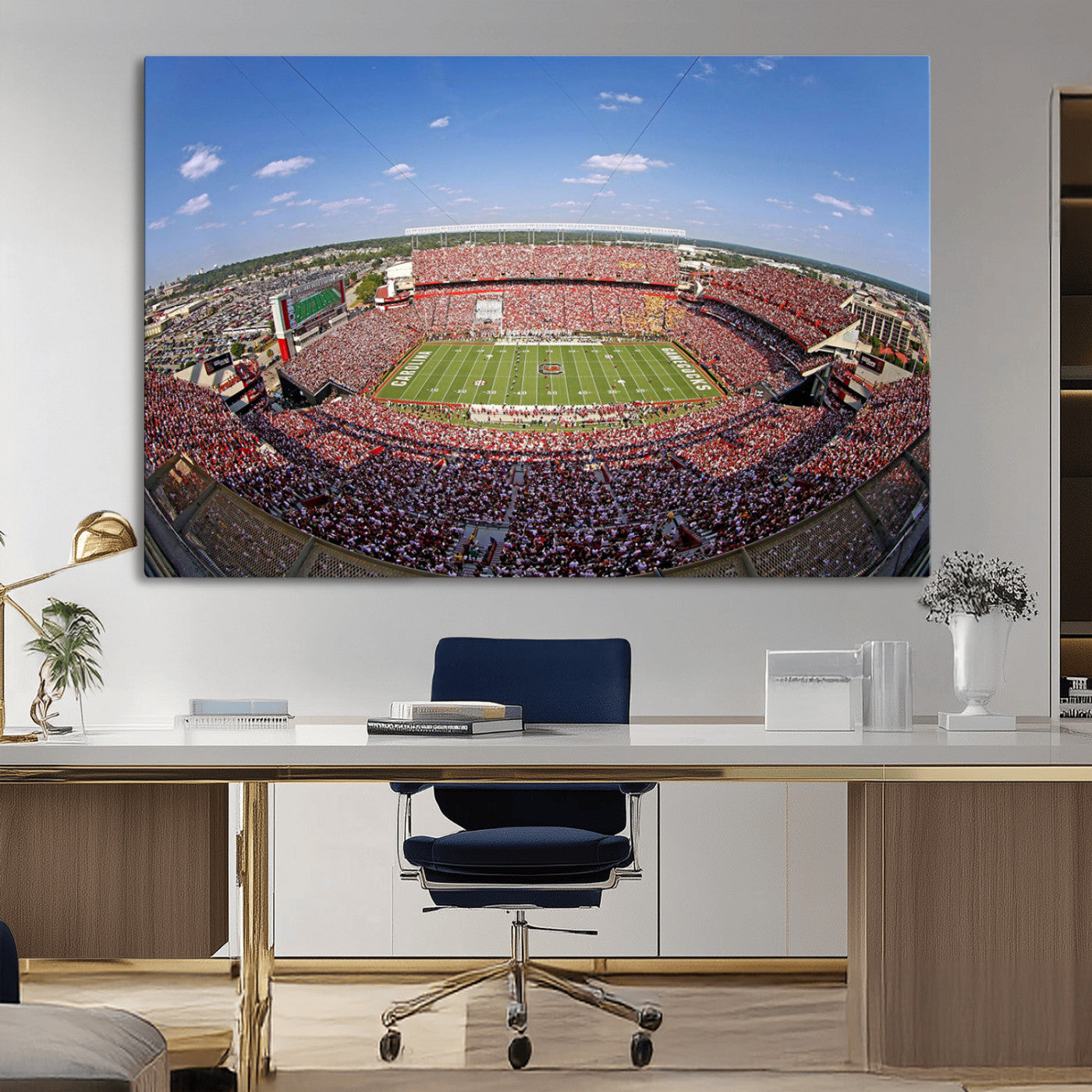 An William Brice-Stadium view of a full football stadium with cheering fans and clear blue skies, capturing the excitement and energy of the game.