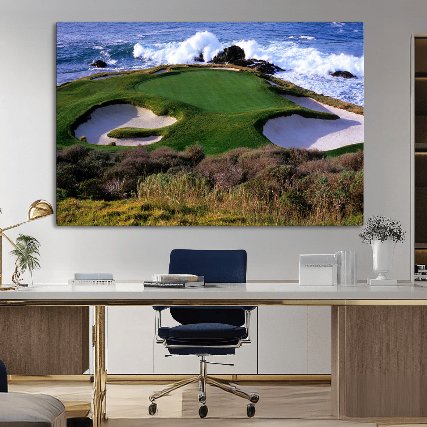 A scenic golf course located by the ocean, featuring a well-manicured green surrounded by sand traps and powerful ocean waves crashing on the shore.