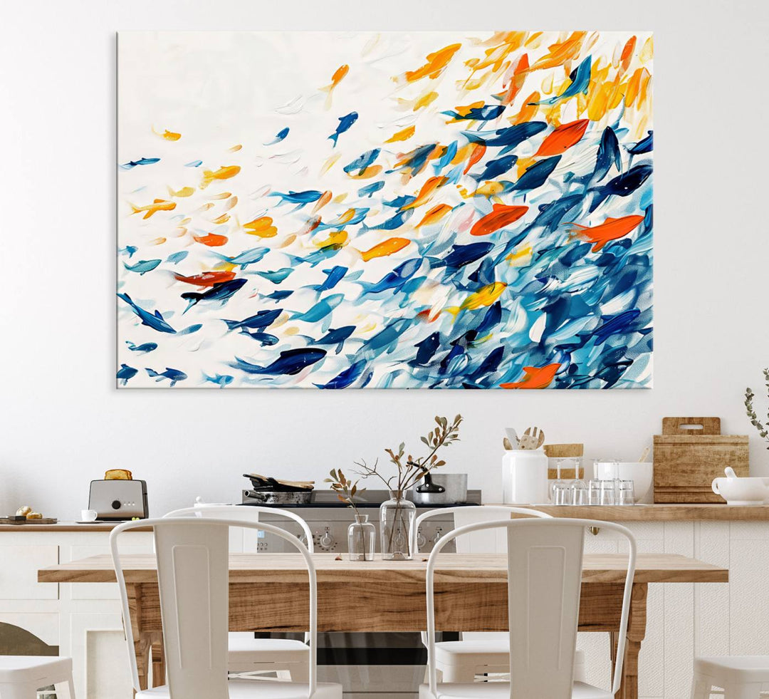 A colorful Abstract Fish Shoal Canvas Print hangs on the wall.