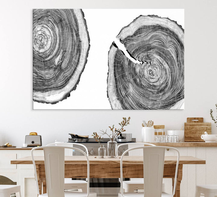 The modern black and white tree rings canvas art adds minimalist geometric decor with nature inspiration.