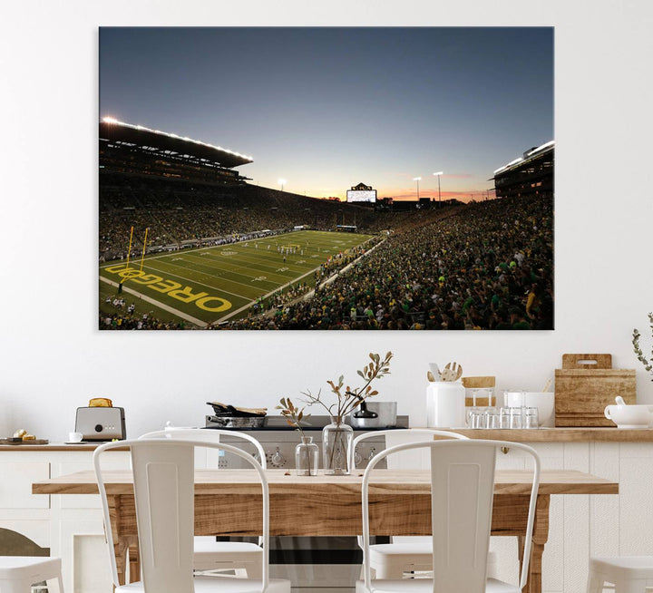 Canvas artwork depicting an Oregon Ducks football game at Autzen Stadium, capturing a sunset and packed stands.