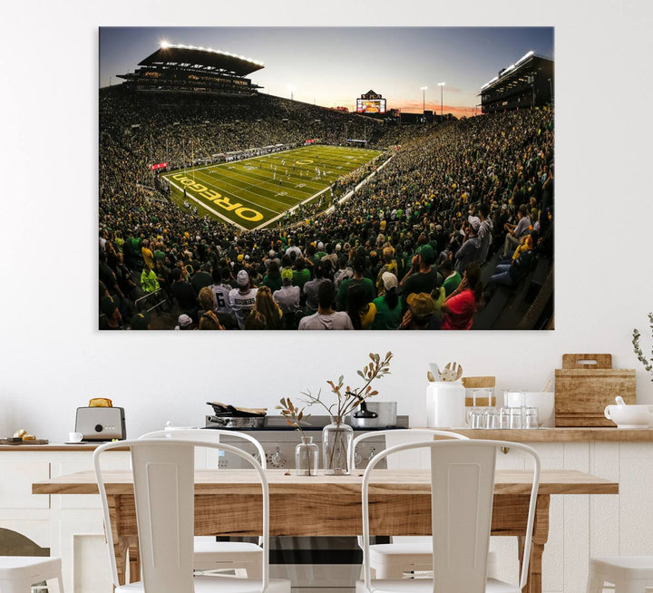 The Oregon Stadium Canvas Wall Art features a depiction of a packed Autzen Stadium with OREGON prominently displayed on the field.