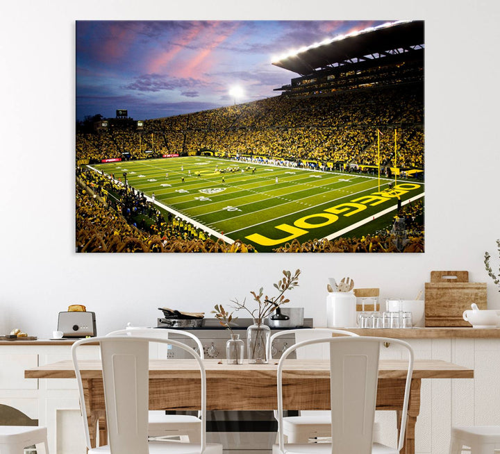 This gallery-quality canvas print features a depiction of the OREGON field filled with fans at sunset, capturing the essence of the University of Oregon Ducks Autzen Stadium.