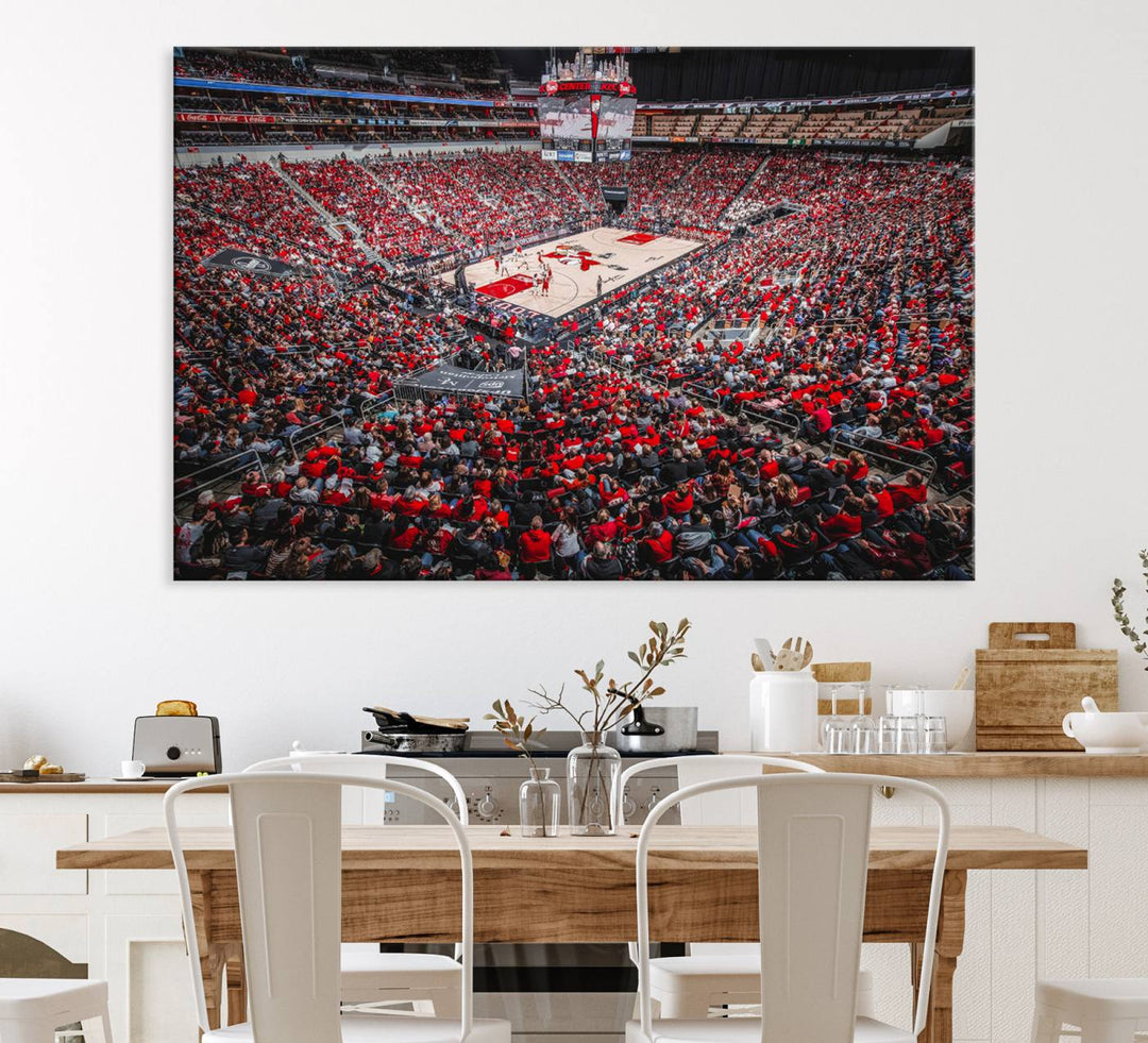 A painting of Louisville Cardinals fans in red at the KFC Yum Center Arena.