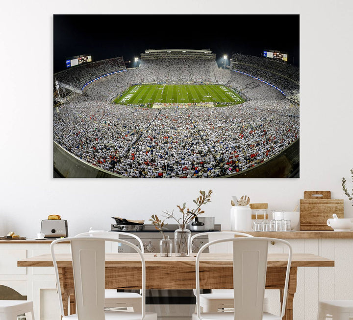 The triple canvas wall art depicts Beaver Stadiums vibrant atmosphere during a night game from the end zone.