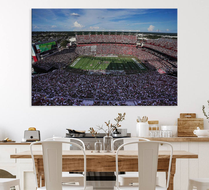 The wall art is a South Carolina Gamecocks print, showcasing Williams-Brice Stadium from a distance under clear skies.