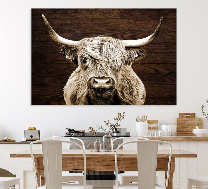 Highland Cow Wall Art Canvas Print: Majestic Scottish bull on rustic decor, ready to hang.