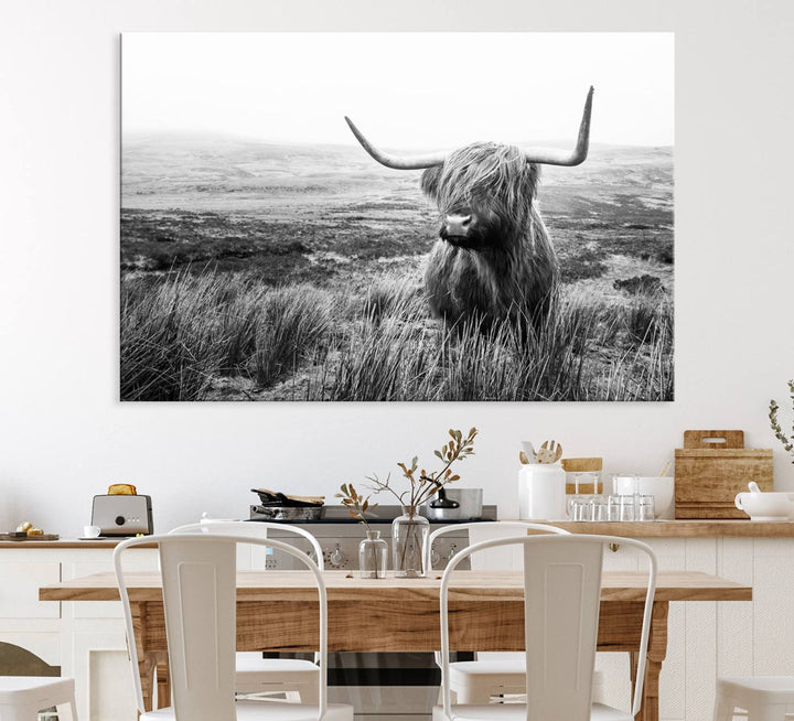 The Scottish Highland Cow black and white canvas print adds rustic farmhouse charm to any wall.