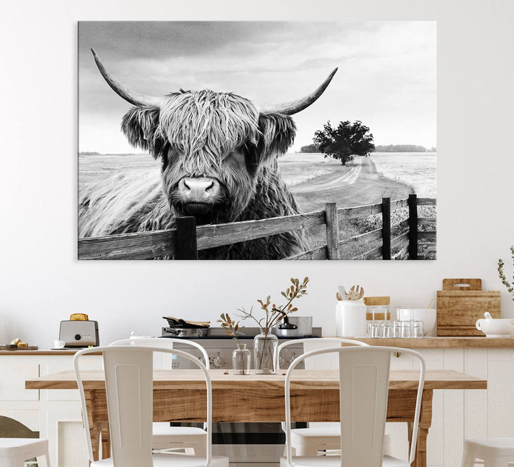 The Scottish Highland Cow Wall Art, a black and white canvas print, enhances rustic farmhouse décor.