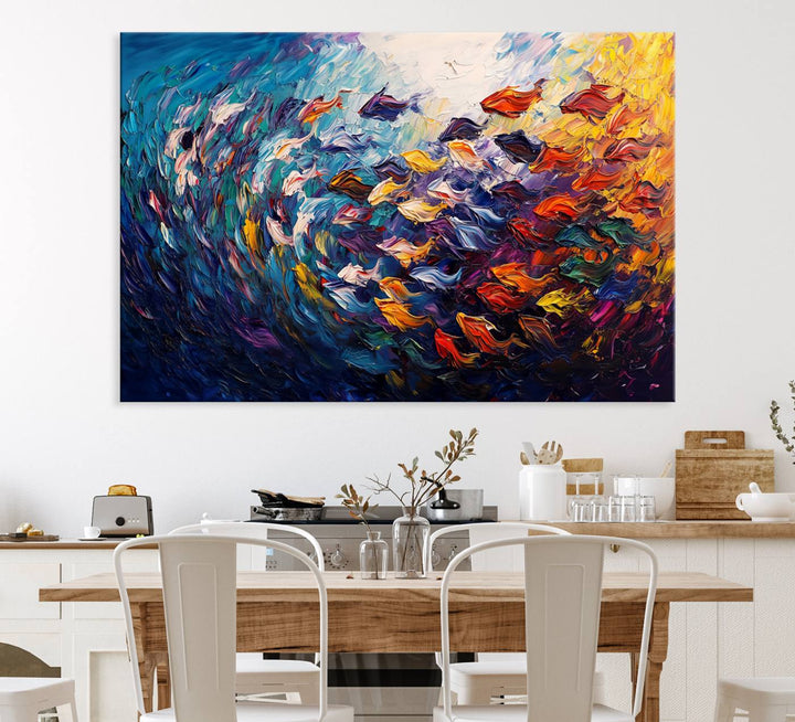 The Vibrant Abstract Fish Swarm Art features a colorful 3-piece canvas that adds a pop of color.