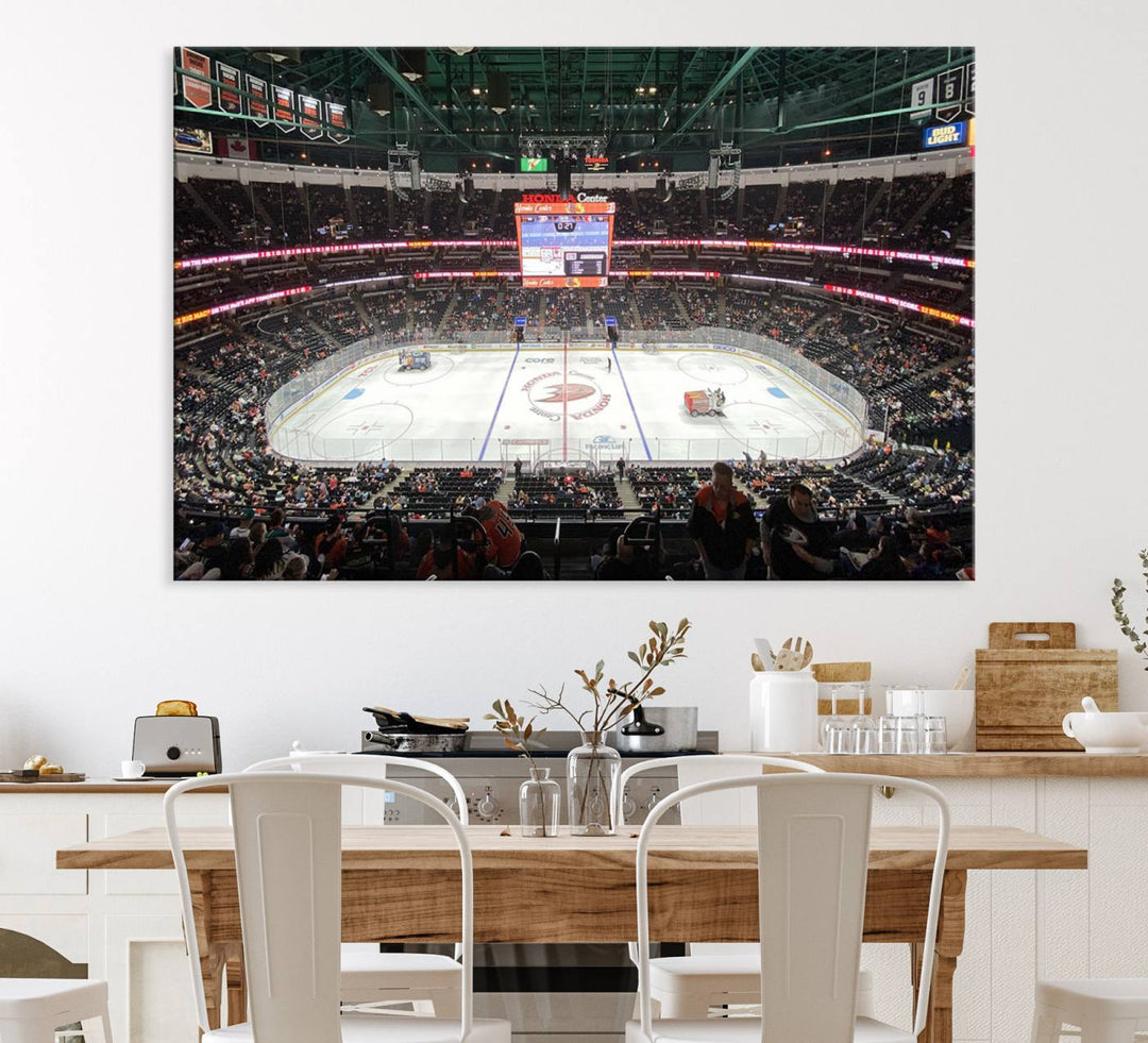 The wall art of the Honda Center California Anaheim Ducks Ice Hockey Stadium features a depiction of the rink and scoreboard from the perspective of the upper deck.