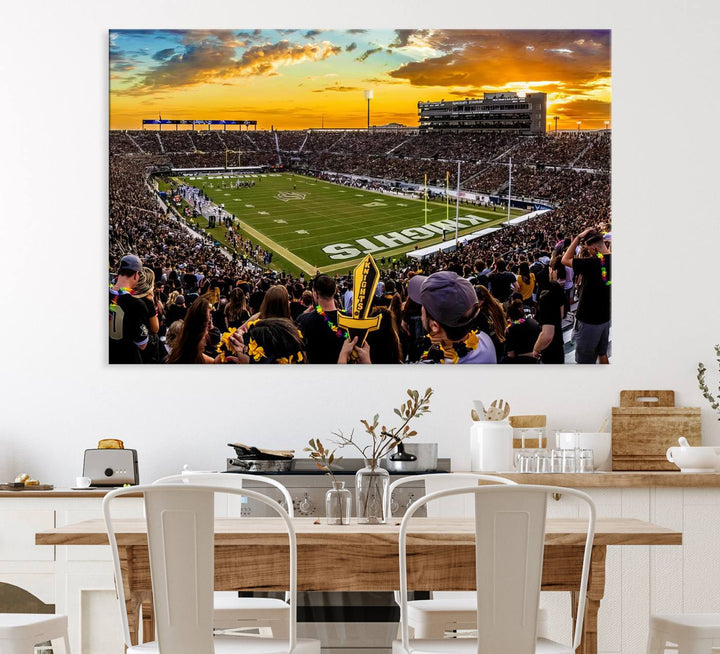 A sunset football game at UCFs Stadium—ideal as a premium wall art canvas print for your home.