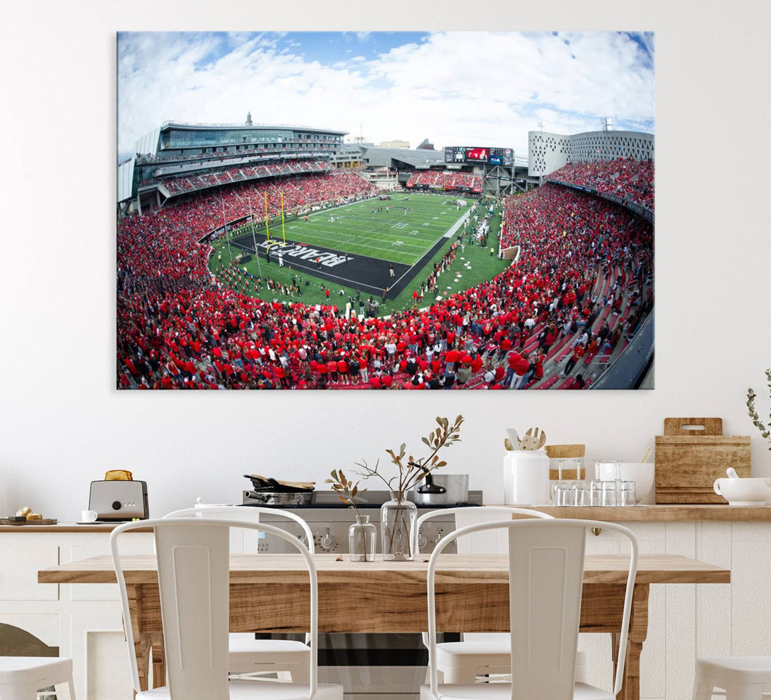 The wall showcases a Nippert Stadium canvas print of the Cincinnati Bearcats.