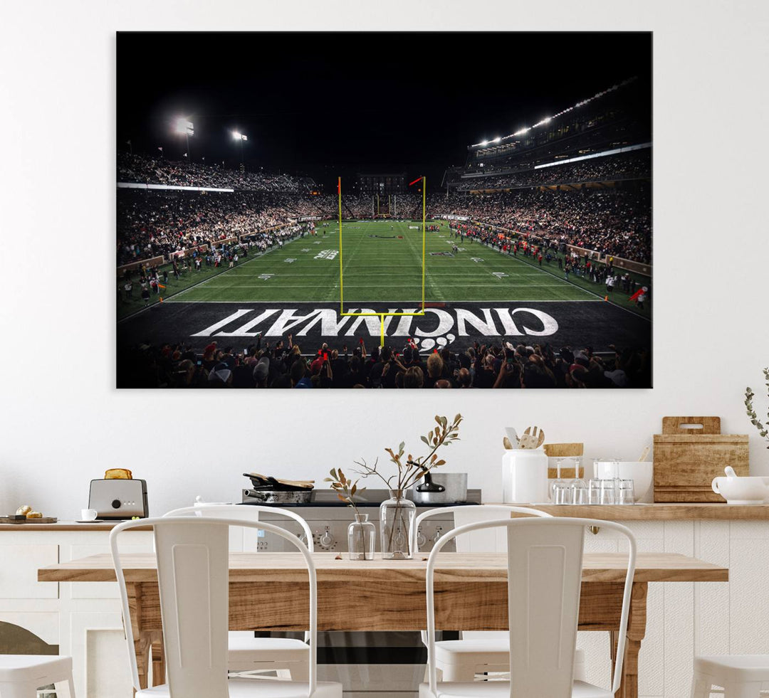 Interior view featuring a Cincinnati Bearcats football canvas of Nippert Stadium.