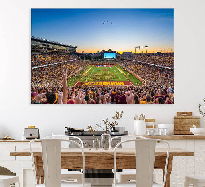 Canvas wall art featuring the University of Minnesota Football Team print, showcasing Huntington Bank Stadium at sunset with jets overhead.