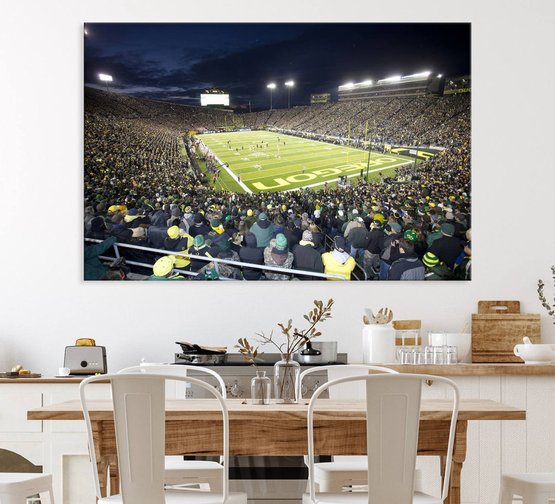 Under bright lights, a University of Oregon Ducks Canvas Print captures the excitement of fans packing Autzen Stadium for a night football game.