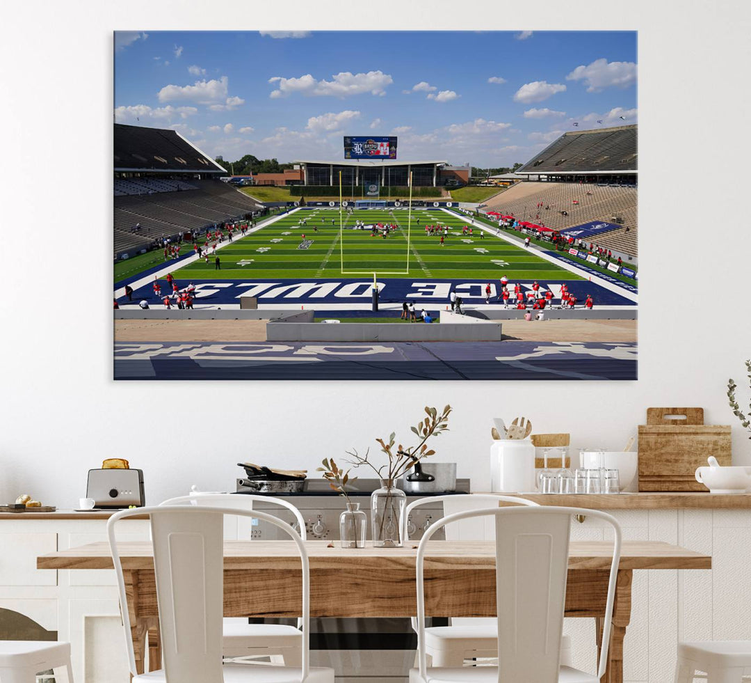 Rice Stadium print: This artwork features a football field with empty stands and a gallery-quality finish under a clear blue sky.