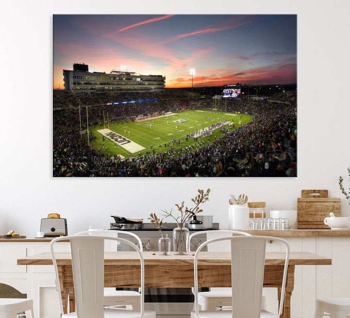 This wall art canvas print captures UCONN Huskies fans energizing a sunset scene at East Hartfords Pratt & Whitney Stadium.