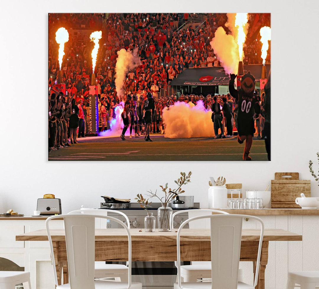 This canvas print captures the UTSA Roadrunners storming the Alamodome under smoke and fire.