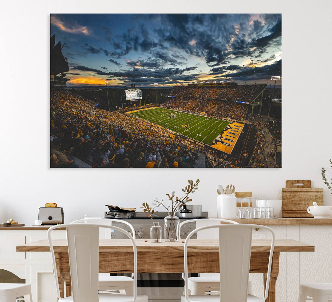 This University of Wyoming Cowboys canvas print features an aerial view of War Memorial Stadium at dusk, highlighted by dramatic clouds.