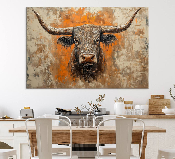 Abstract Cow Longhorn Bull Wall Art presents a detailed face centered on a textured orange and beige background.