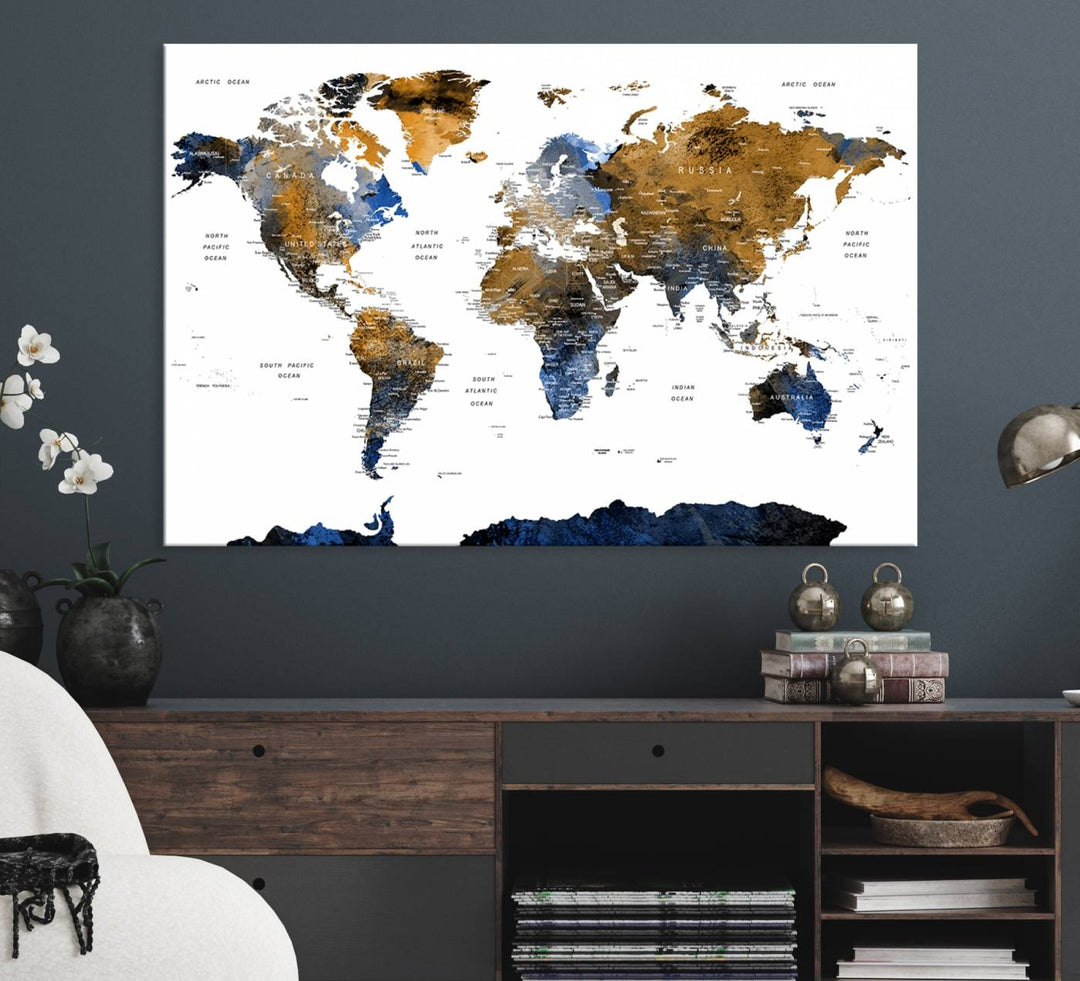 The Watercolor World Map Canvas showcases a grunge-stained background in gold, gray, and blue hues.