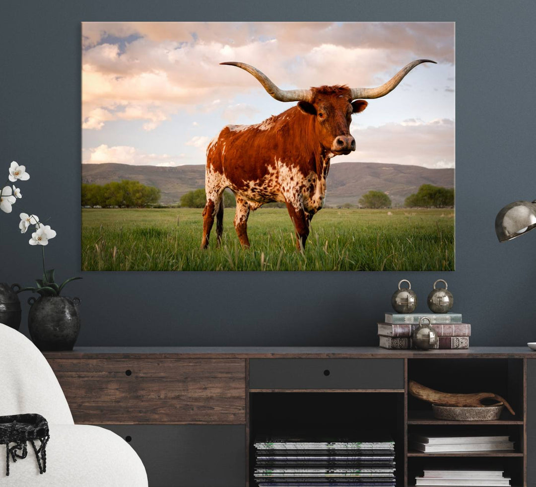 The Texas Cow Canvas Wall Art print captures a longhorn cow at sunset and is ready to hang.