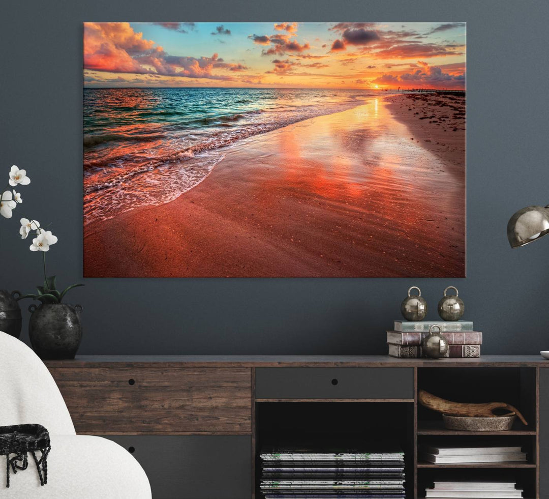 A Vibrant Sunset Beach Canvas Print with ocean waves and sandy shoreline enhances coastal-themed interiors.