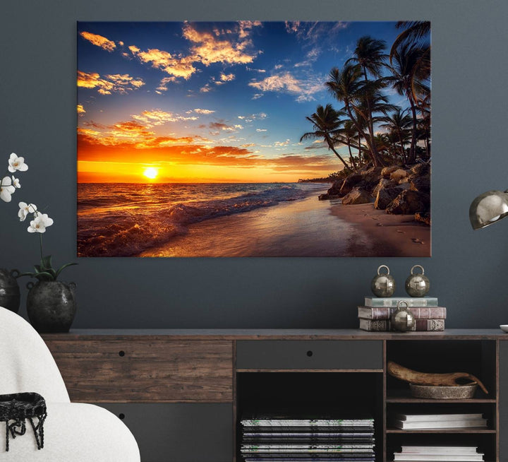 A stunning Tropical Beach Sunset Canvas Art featuring palm trees and ocean waves, created as a Giclee print.