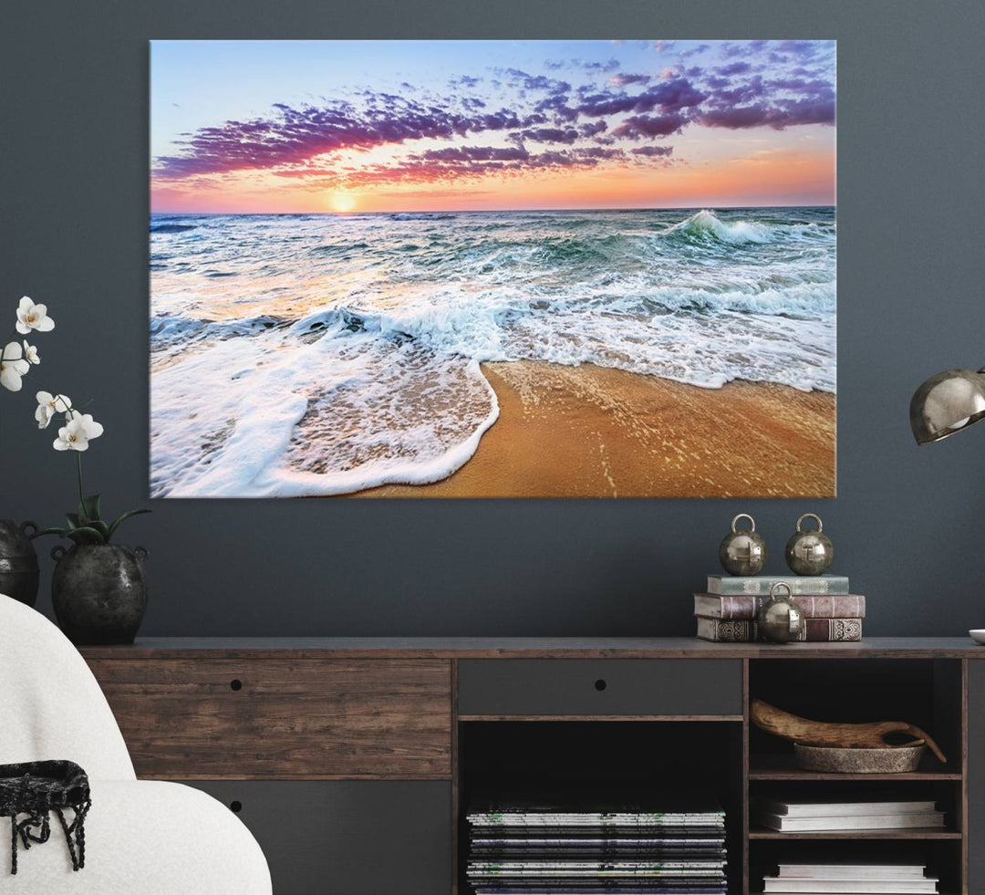 The Vivid Sunset Ocean Waves Triptych hangs on a wooden wall.