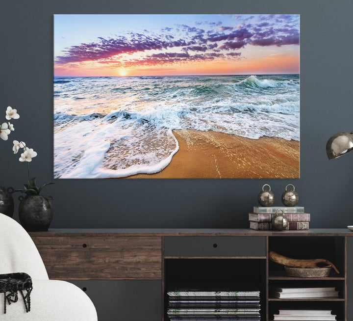 The Vivid Sunset Ocean Waves Triptych hangs on a wooden wall.