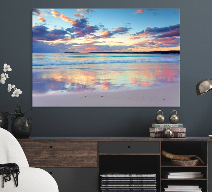 The Tranquil Pastel Sunset Beach Triptych Canvas Art hangs, showcasing its serene beauty.