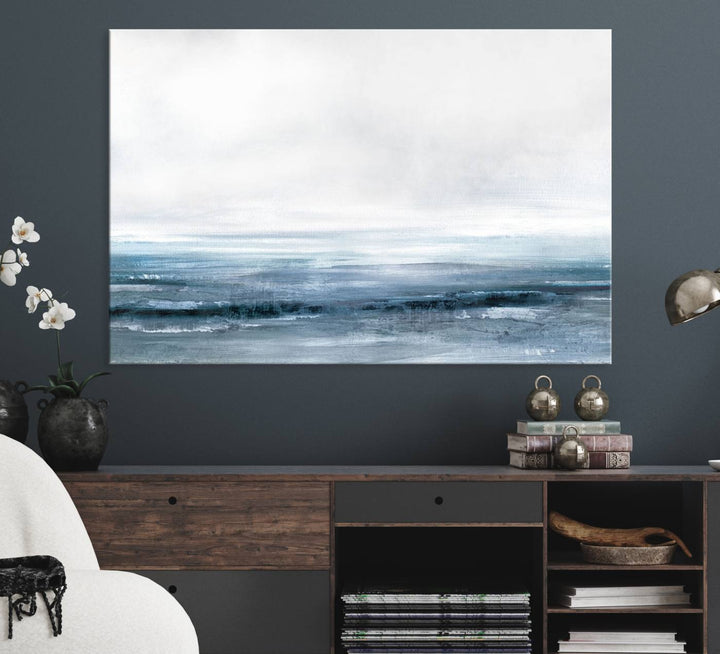 The dining area features Blue Ocean Abstract Artwork on canvas.