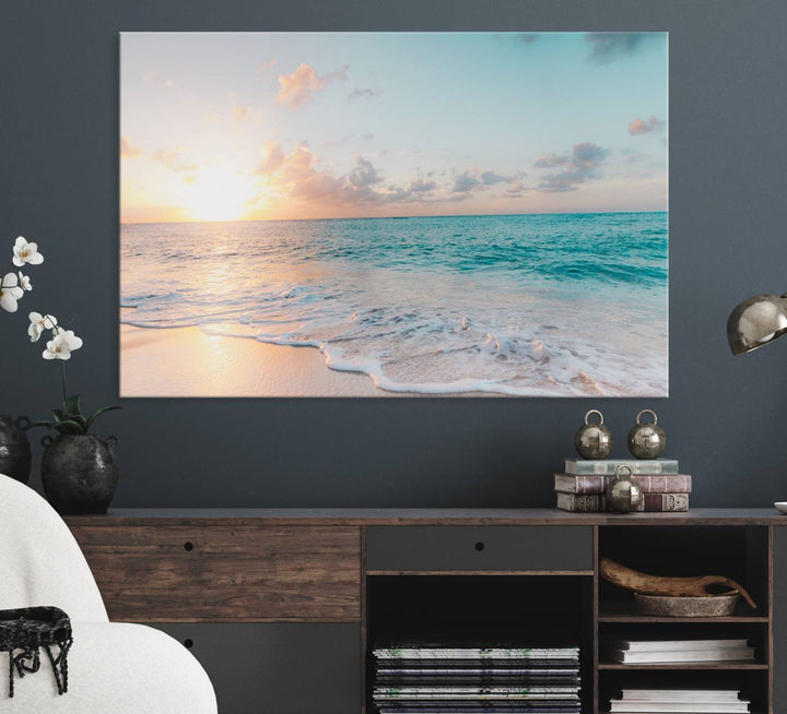 The room features a 3-panel Tranquil Ocean Beach Sunset Canvas Wall Art.