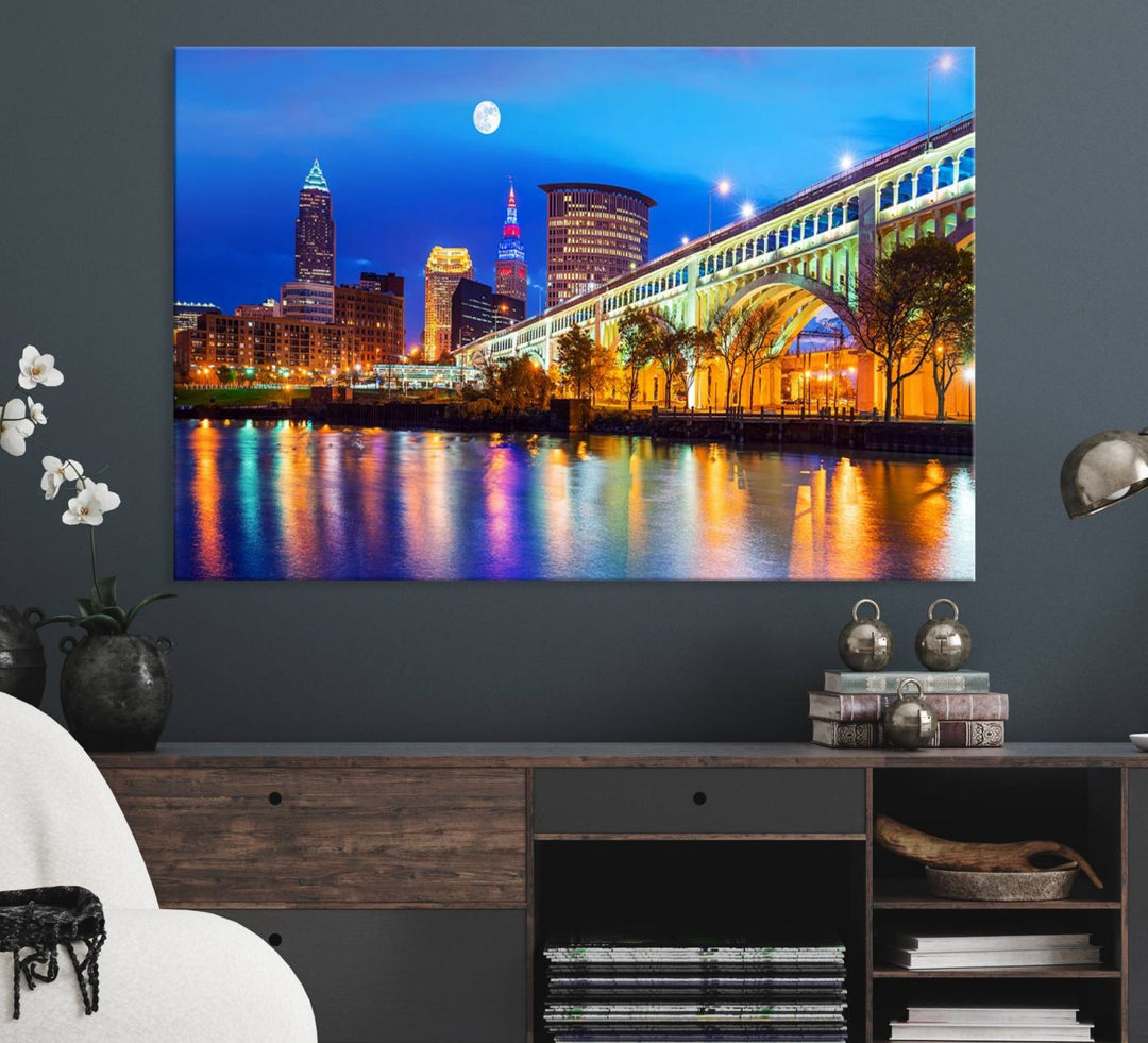 A Cleveland Night Skyline Wall Art on museum-quality canvas showcases a bridge and illuminated buildings.