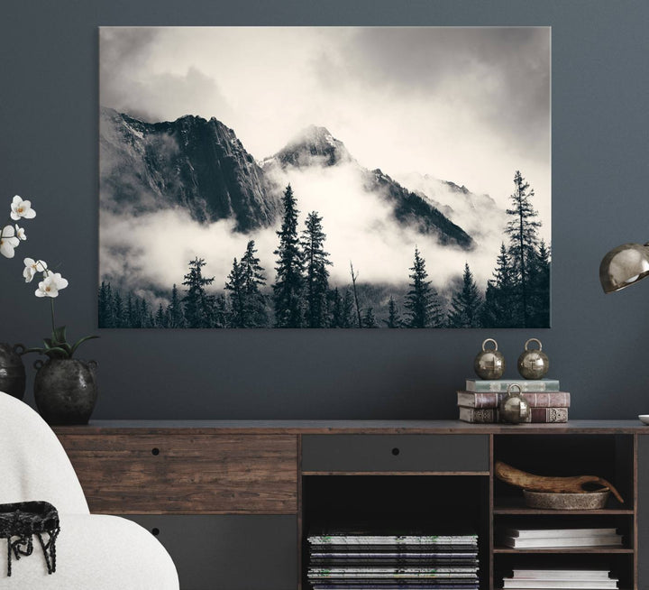 A large foggy mountain forest canvas print hangs prominently in the room.