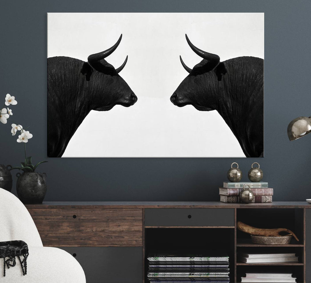 Spanish Bull Wall Art Canvas Print: Two black bull heads facing off on museum-quality canvas.