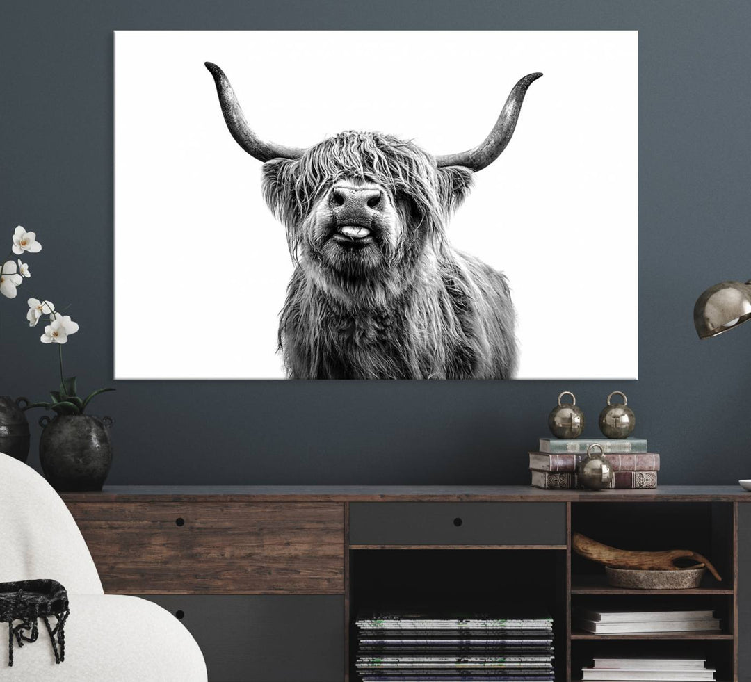 The Fanny Highland Cow art print decorates the modern kitchen, featured in black and white.