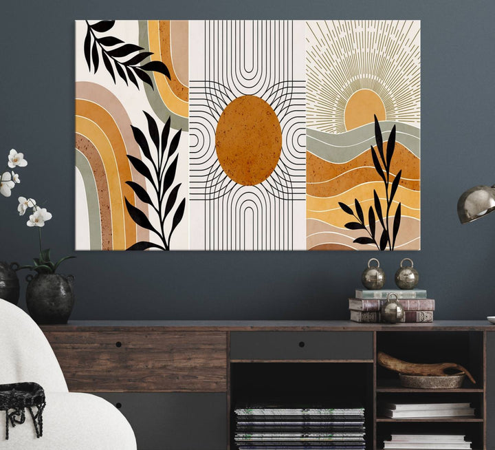 The Modern Boho Sun and Leaf giclée canvas is a 3-panel piece designed for mid-century or bohemian decor.