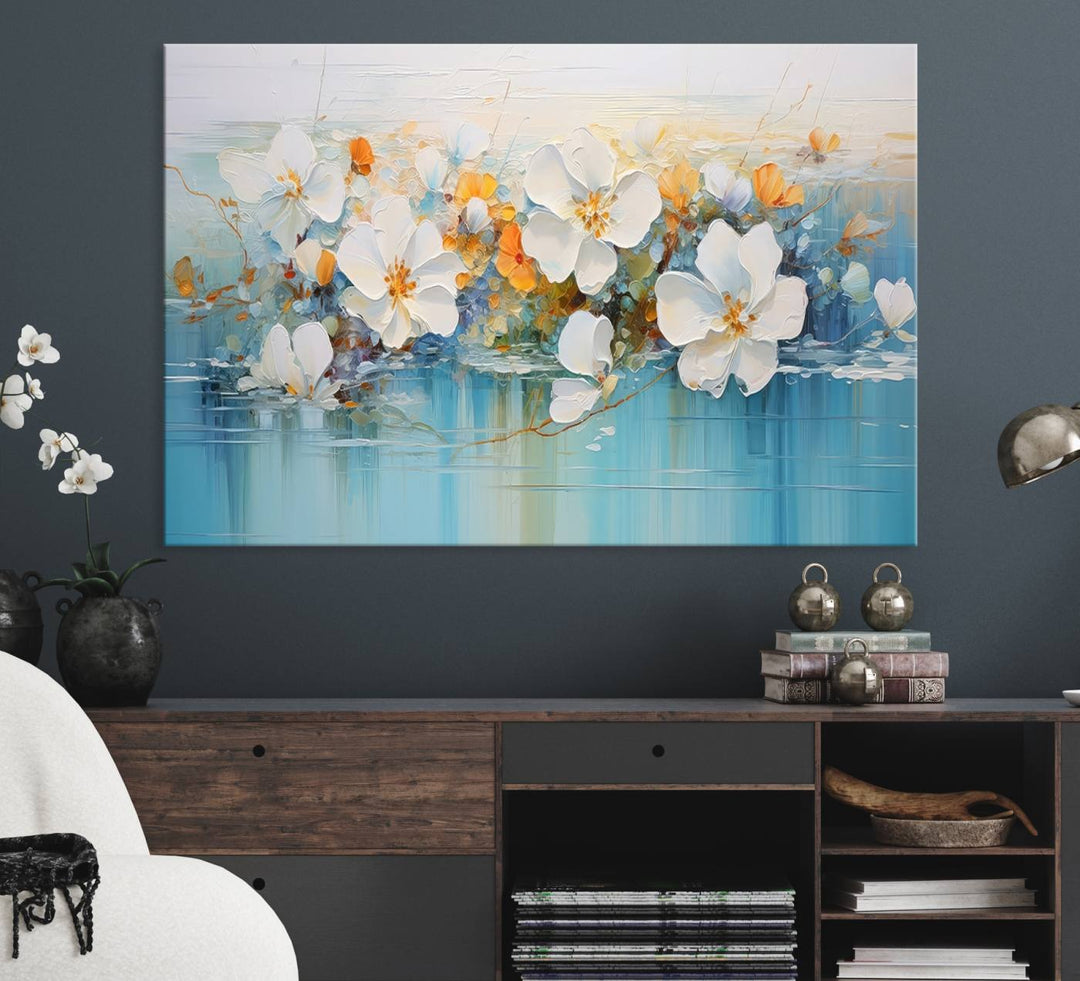 An Abstract Flower Wall Art Canvas Print in blue and orange hues.