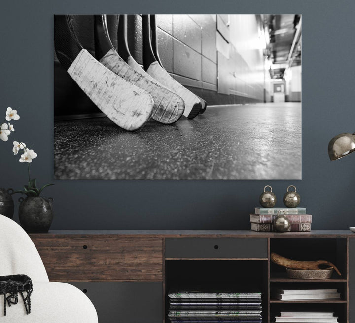 Ice Hockey Wall Art Canvas Print features a UV-protected black and white photo of hockey sticks.