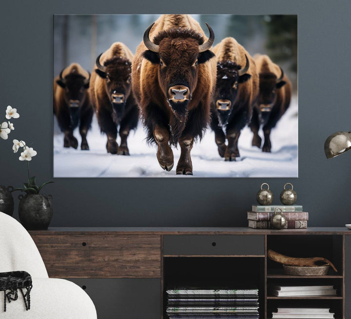 The dining room features an American Bison Herd Canvas Print against the snow.