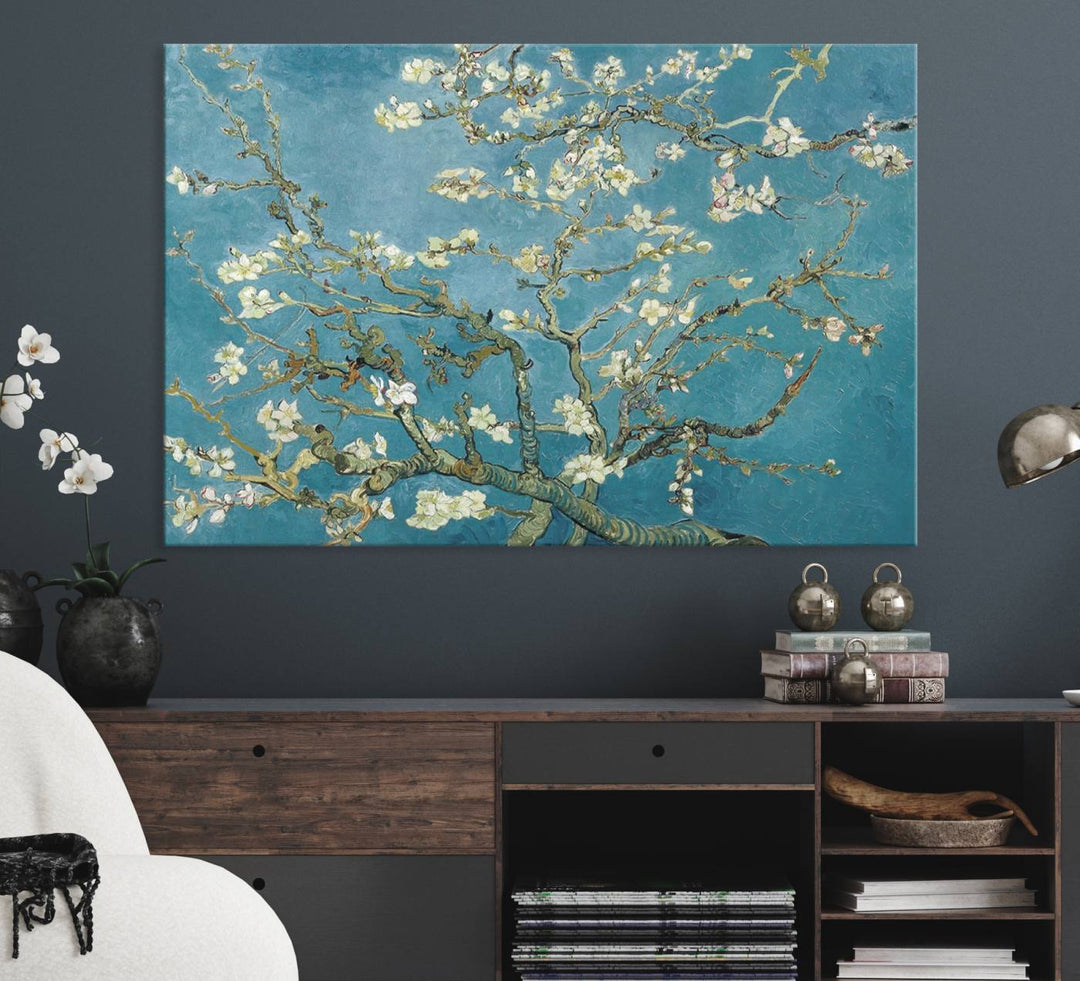 The wall art, Vincent Van Goghs Almond Blossom, stands out with its vibrant depiction against a serene blue background.