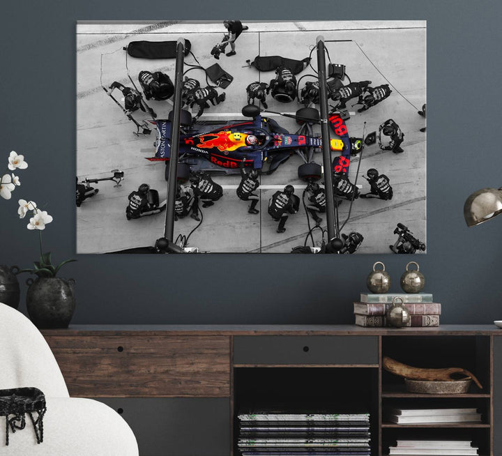 Red Bull Formula 1 Canvas Wall Art Print: An aerial view of a Formula 1 pit stop featuring a Red Bull car on premium canvas.