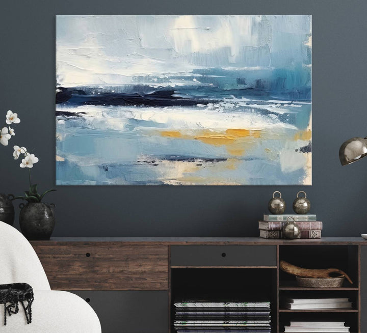 The Abstract Ocean Canvas Wall Art in coastal blue and gold enhances the modern kitchen.