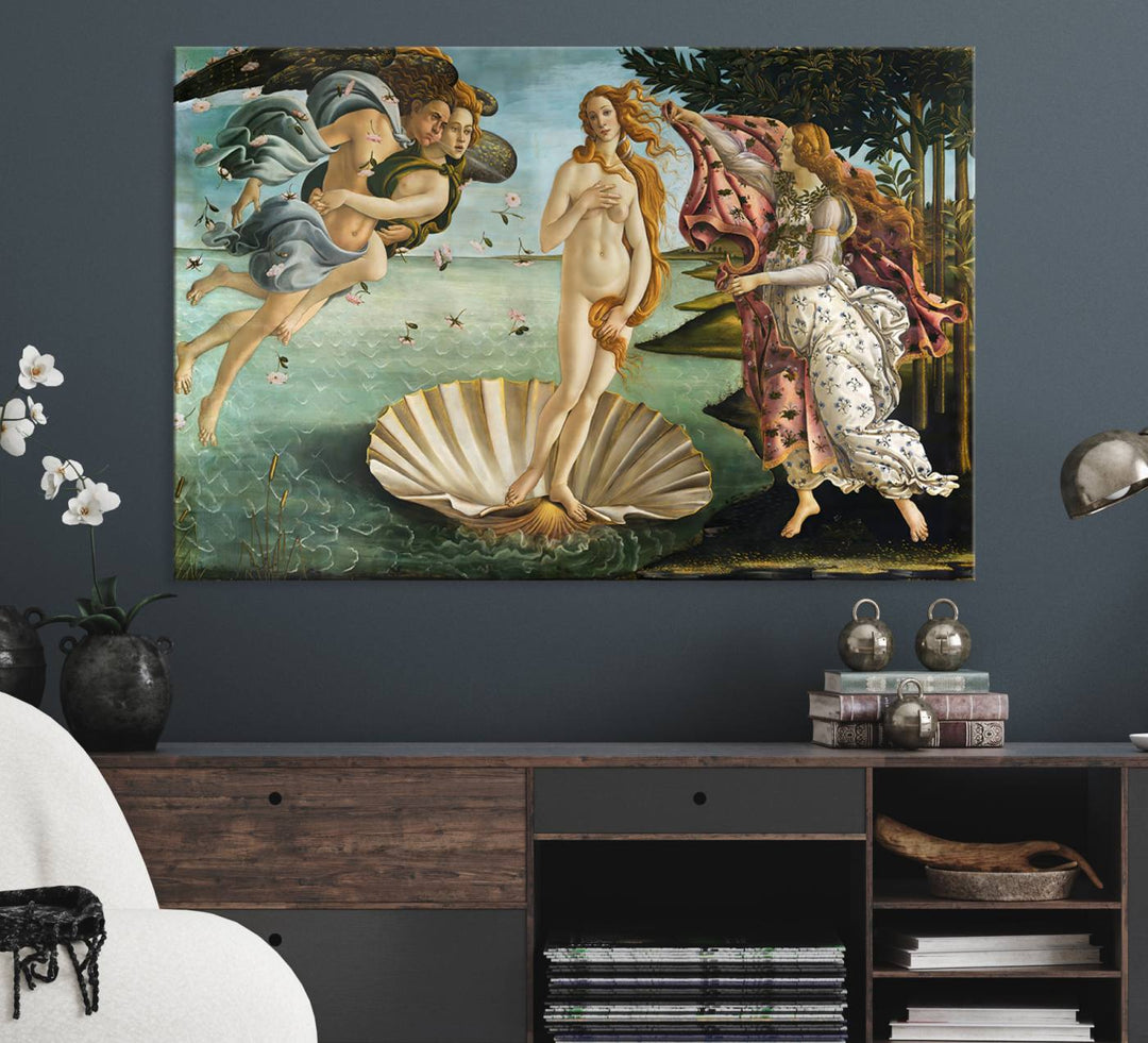 A canvas print of Botticellis The Birth of Venus is displayed on the wall.