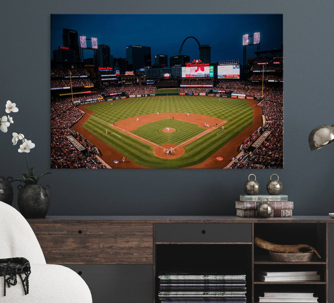 A St. Louis Cardinals Baseball Team print of Busch Stadium at night adorns the wall.