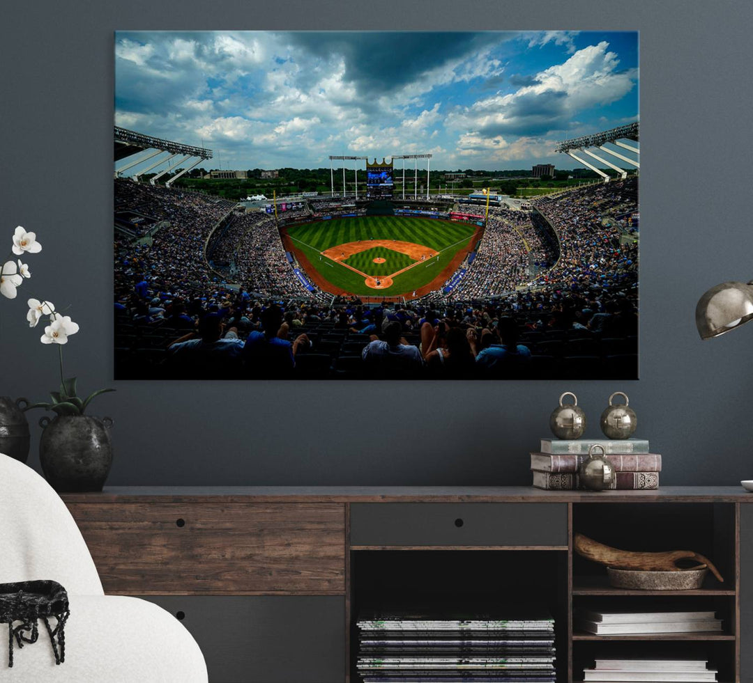 A 3-panel print of Kauffman Stadium, showcasing a crowded baseball field under cloudy skies.